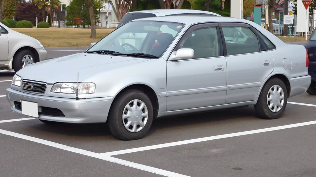 A Toyota Sprinter Sedan, similar to those offered from online used Japanese car dealer BE FORWARD.