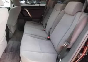 The back seats of a used 2009 Toyota Land Cruiser Prado from online used Japanese car dealer BE FORWARD.