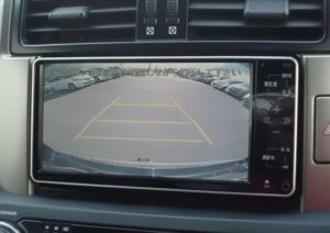 The infotainment screen of a used 2009 Toyota Land Cruiser Prado from online used Japanese car dealer BE FORWARD.