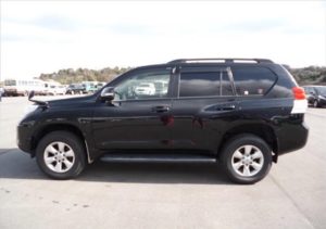 The side of a used 2009 Toyota Land Cruiser Prado from online Japanese car dealer BE FORWARD.